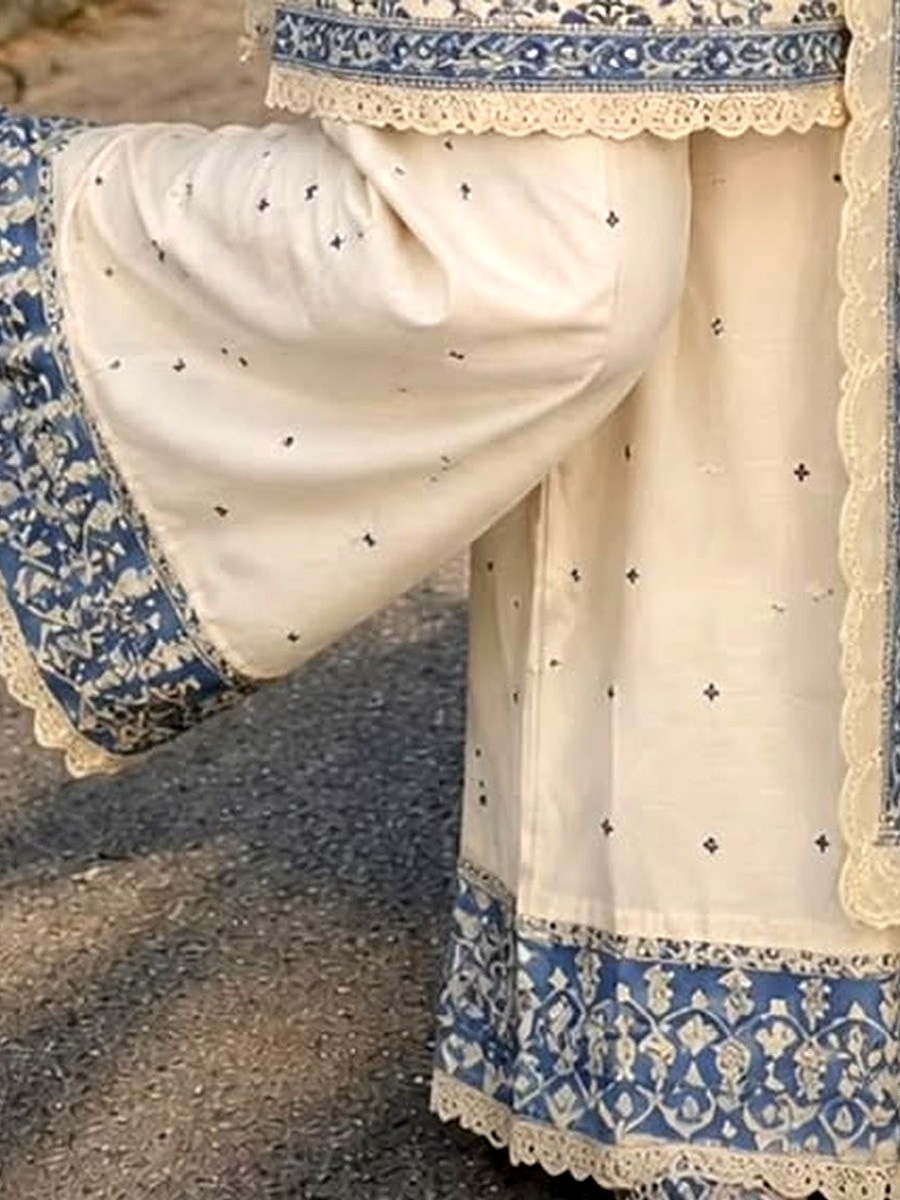 The matching trouser with its lace daaman